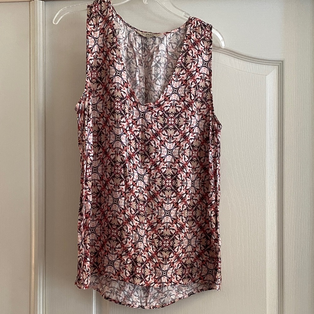 Liverpool Sleeveless Blouse with orange, tan and black design.